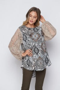 Just Beautiful! This crinkle gauze top from Honeyme features an airy look with lace sleeves and gauze fabric. Comes in S-3X.