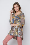 This gorgeous slate blue print top by Honeyme features 3/4 sleeves, a hi/lo hem, and a relaxed fit. Comes in S - 3X.